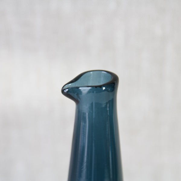 Detail of carafe 1747 by Tamara Aladin showing handmade pourer spout in steel blue glass