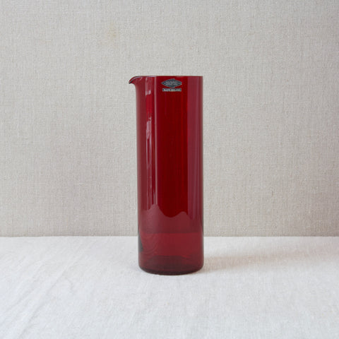 A tall perfectly cylindrical Model 1609 Cocktail Pitcher designed by Finland's most influential industrial designer Kaj Franck. Without a doubt, this design shows Francks interest in laboratory glass.
