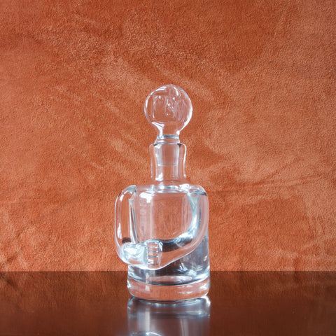 Vintage Erik Höglund Swedish glass decanter in the shape of a person, available at Art & Utility, London