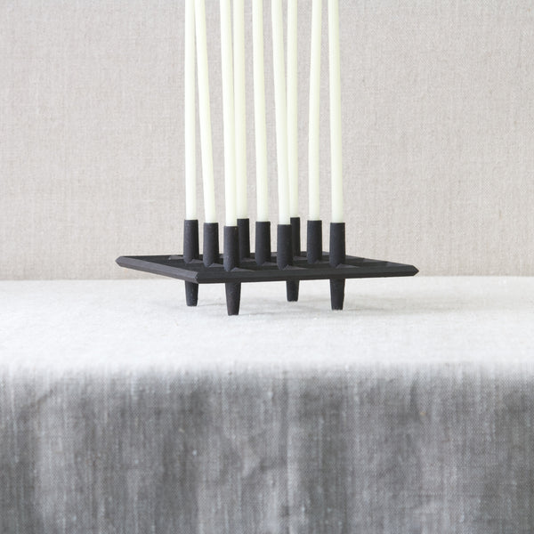 Jens Quistgaard Dansk Designs cast iron scandinavian candle holder for tiny taper candles