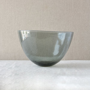 A large clear 'Carborundum' bowl by Erik Höglund, the glass sparkles in sunlight.