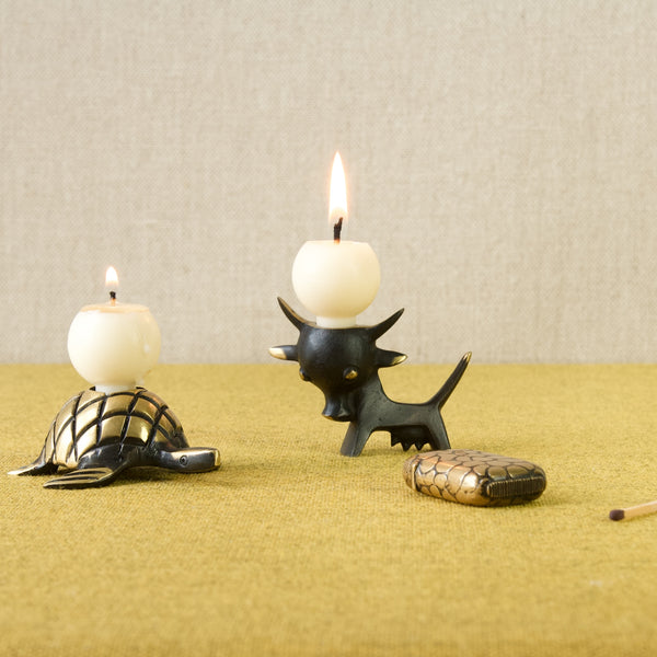 Walter Bosse black golden line patinated brass animal candleholders including a rare tortoise and a stylish cow, produced by Baller Austria in the 1950s