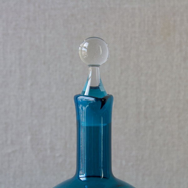 Detail of clear stopper for vintage Finnish blue glass decanter by Nanny Still for Riihimaki