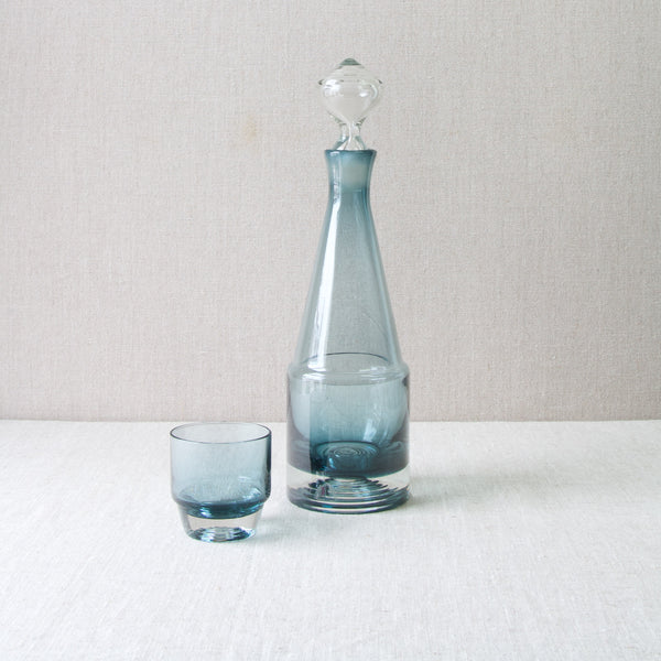 A tall Paraati decanter and a drinking glass. Design by Nanny Still. Buy online at www.artandutility.co.uk