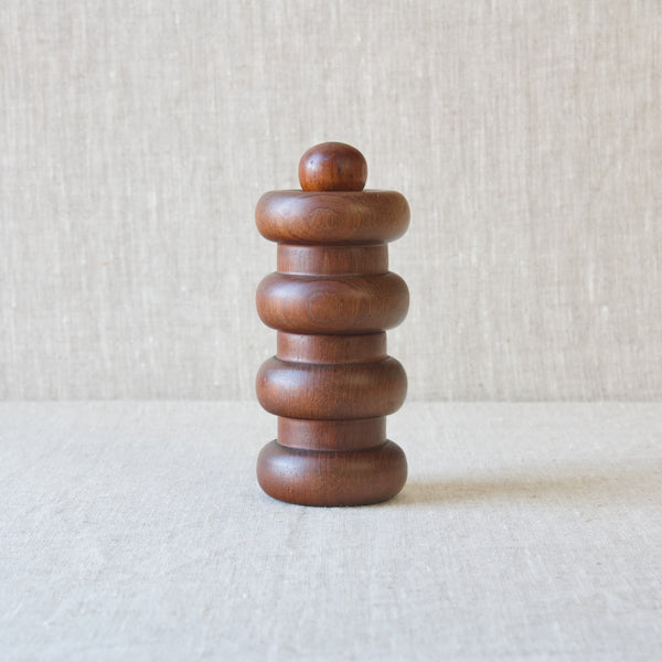 Jens Quistgaard Modernist peppermill made from carved teak in an abstract 'four donuts' shape