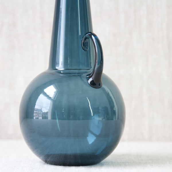 Detail of modernist handmade 1747 carafe by Tamara Aladin, Finland, made from steel blue glass at Riihimaki Glassworks, Finland