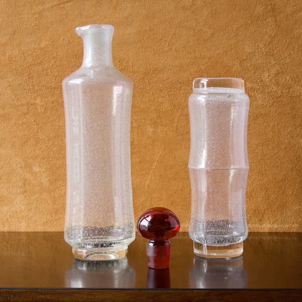 Rare Star decanter and glasses by Tamara Aladin for Riihimaki Finland with red stopper and bubbles inside glass.