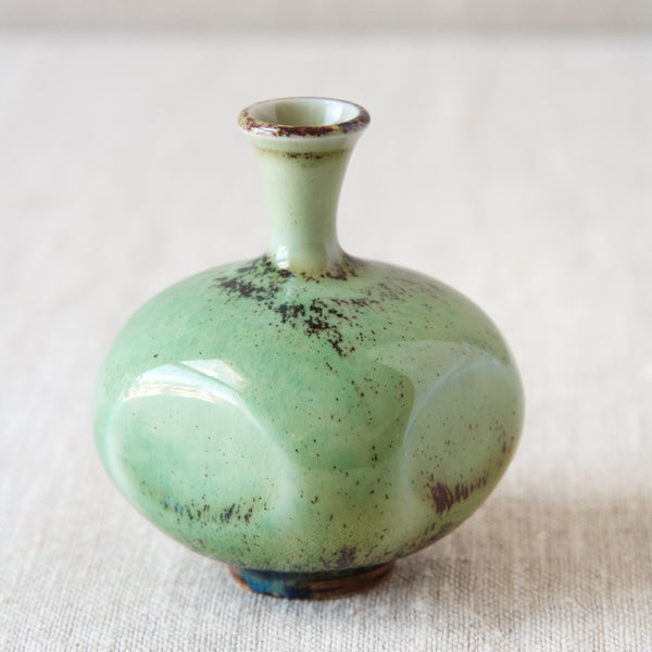 Close up photo showing the intricately detailed turquoise green glaze on a Gustavsberg ceramic vase designed and made by leading Swedish ceramicist Berndt Friberg.