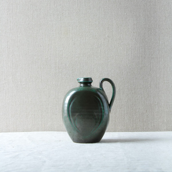 An Art Deco Harald Östergren ceramic jug with handle made in the 1920s. Available for shipping worldwide, including China and Japan.