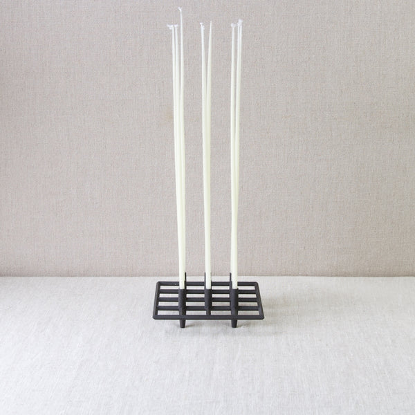 Tiny taper 'Trivet' candle holder designed by Jens Quistgaard for Dansk Designs IHQ
