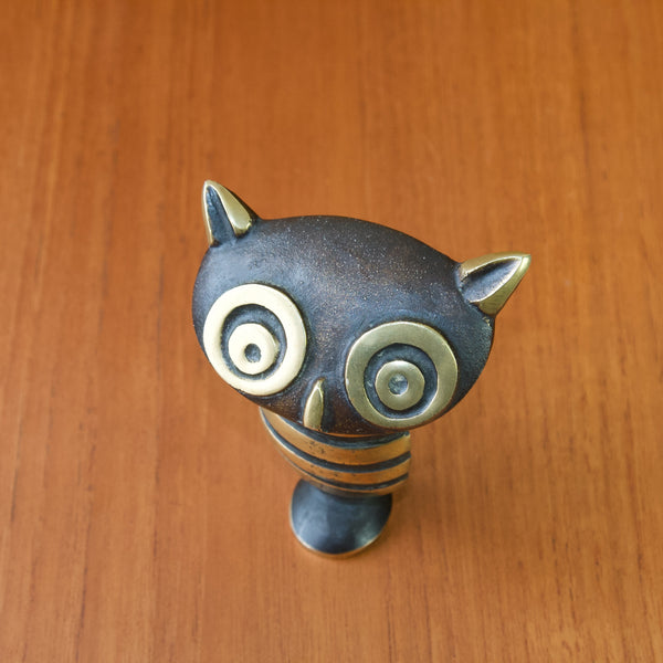 Close up showing the fine execution on this Owl shaped bottle opener corkscrew by Walter Bosse. Rather than being painted the dark surfaces have been black patinated in an electrified acid bath.