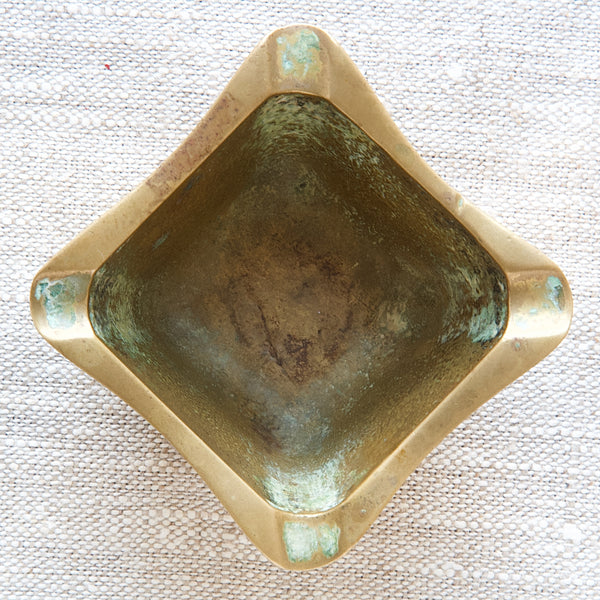 Detail of verdigris, age and use of Richard Brass ashtray 