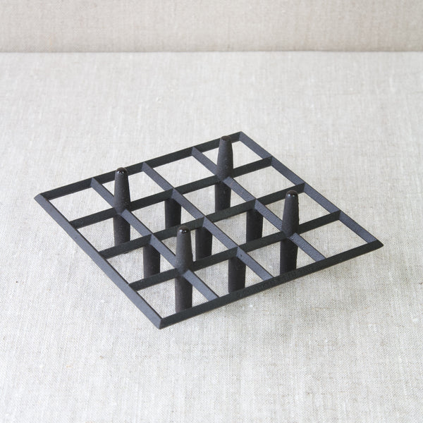 Vintage rare Jens Quistgaard mid-century modernist danish tiny taper candle holder cast iron grid design