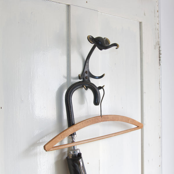 Walter Bosse elephant brass coat hook designed in the 1960s and produced in Germany from patinated brass