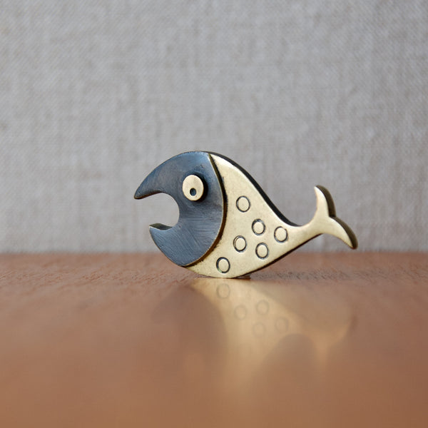 Brass bottle opener in the shape of a fun fish, designed by Walter Bosse for Baller Austria, available in London